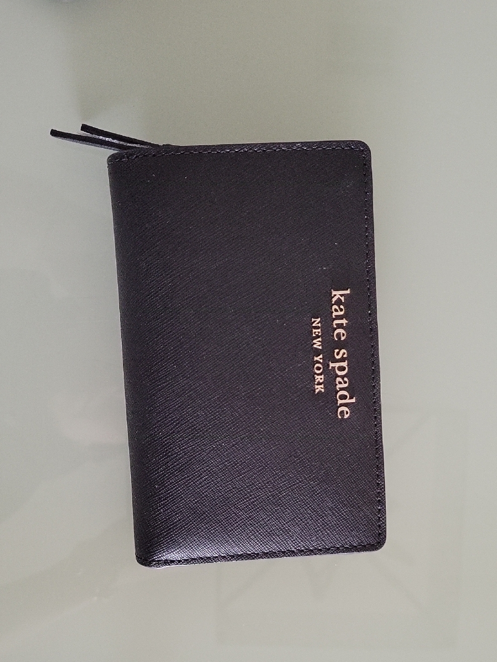 kate spade Medium   Bifold black Cameron zip-around wallet with gold logo
